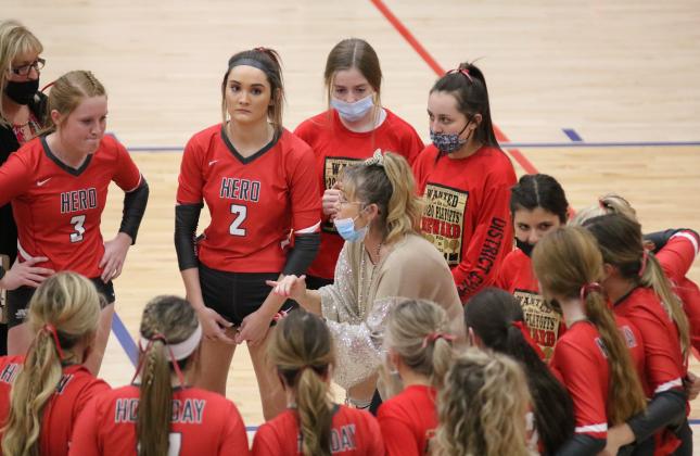 Holliday head coach Wendy Parker talks to the Lady Eagles during a timeout in the first set of their regional semifinal match with Brownfield on Tuesday, Nov. 10, in Tuscola.