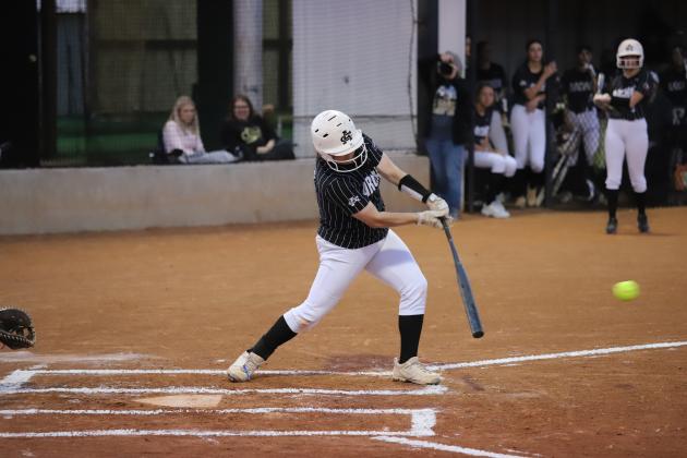 Alyssa Schroeder swings the bat