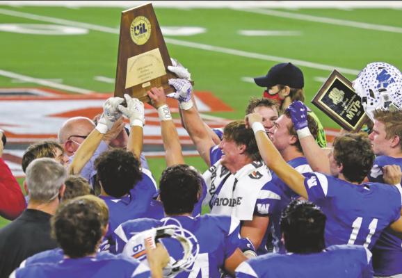 Trojans take home third football state championship in school history