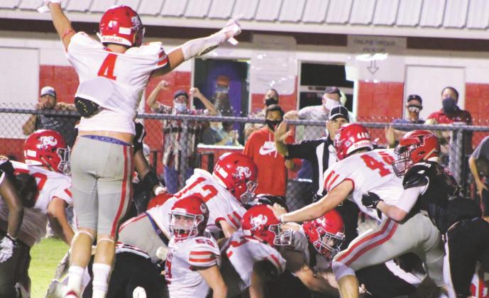 Holliday sophomore Jaxx Johnson plunges across the goal line, setting up the go-ahead 2-point conversion with 21 seconds remaining in the Eagles’ 29-28 win over Eastland on Friday, Sept. 4. Courtesy Photo/Micheal Jones