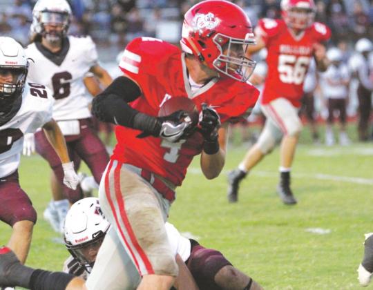 Crae Jackson runs with the ball in the Holliday Eagles second half comeback against the Vernon Lions Friday, Sept. 11. Courtesy photo/Jolene Styles