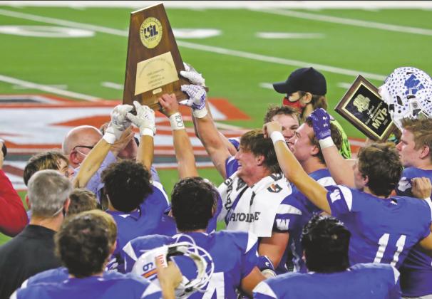 Trojans take home third football state championship in school history