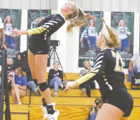 Mallory Maxwell (2) goes for a kill after Jill Liles (22) set her up in Saturday’s game against Iowa Park. Photo/Jenny Schroeder
