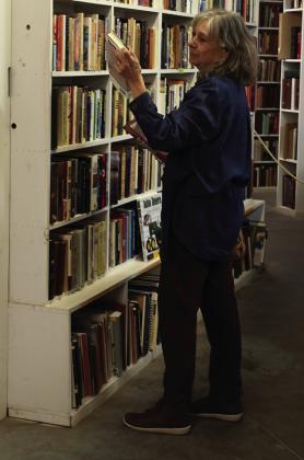 A guest walks through the Larry McMurtry Literary Center during its preview opening on Saturday, Courtesy photo