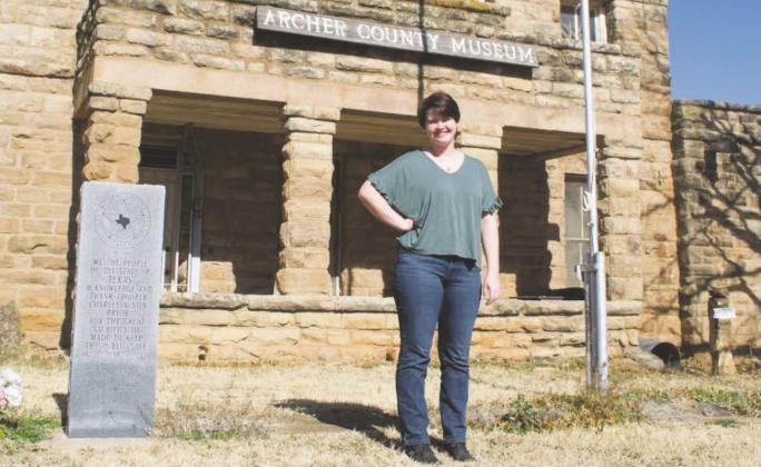 New Archer County Museum &amp; Arts Center Project Director, Callie Lawson, poses in front of the ACMAC. The ACMAC is entering its assesment phase of the project. Photo/Nathan Lawson
