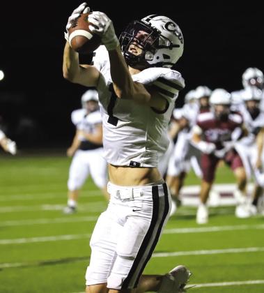 Archer City senior Chance Warren completes the catch for a big gain in the Wildcats 46-28 loss to Seymour on Fri., Sept. 29. Warren finished the night with 13 catches for 180 yards and a score. Photo/Will Edwards