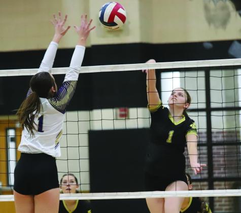 Lady Cat middle Jocelyn Tedrow taps over a kill in Archer City’s five-set thriller against Sterling City in the Regional Semifinals on Thursday, Nov. 6 File photo