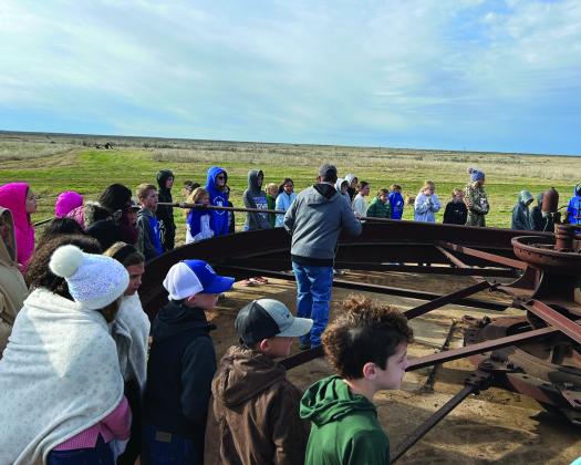A Lindemann Drilling representative shows Windthorst ISD students how oil was produced in the early history of Archer County. Courtesy photo