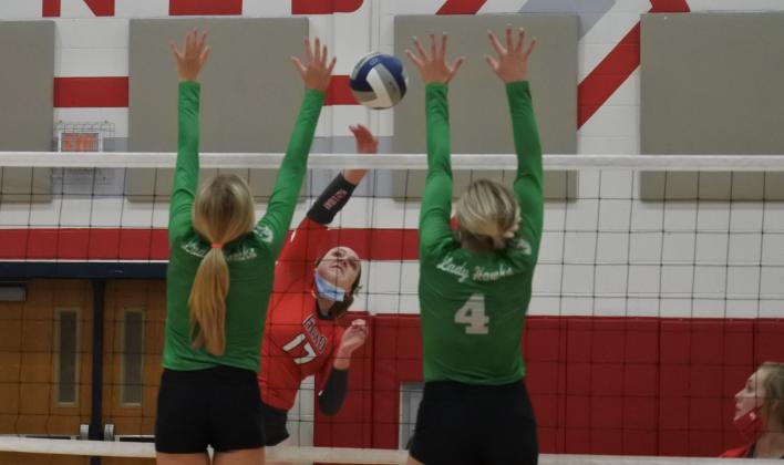 Sophomore Addison Lindemann attacks in the first set of Holliday’s 3-1 win over Wall in the Region I-3A area round on Tuesday, Nov. 3, in Tuscola.