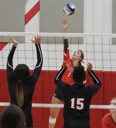 Senior Brittany James swings in the first set of their regional semifinal match with Brownfield on Tuesday, Nov. 10, in Tuscola.