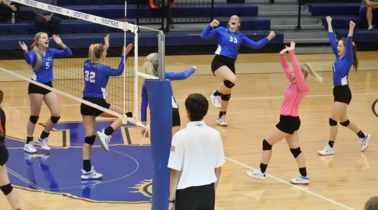 Windthorst celebrates a point in the second set of the Trojanettes 3-0 win over Petrolia on Tuesday, Sept. 29.