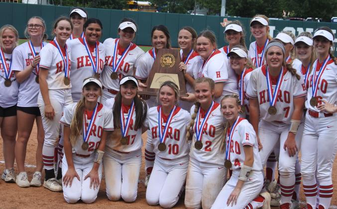 Holliday poses with the state semifinalist trophy following a 9-3 loss to Diboll on Wednesday in Austin (Photo/Will Edwards)