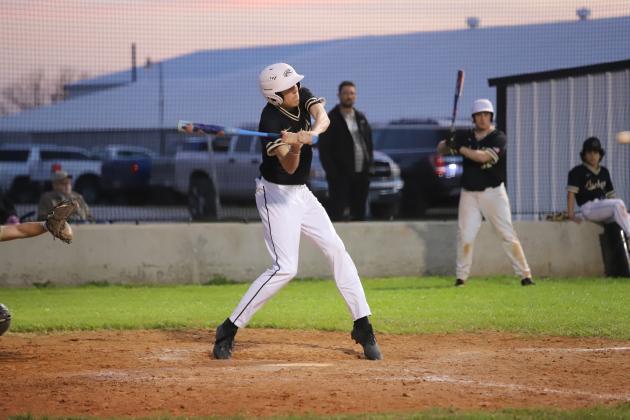 Chance Warren swings the bat