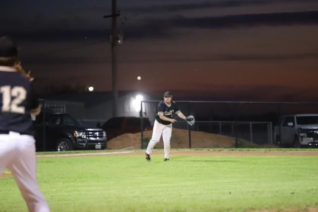 Brendan Mason makes the throw to first
