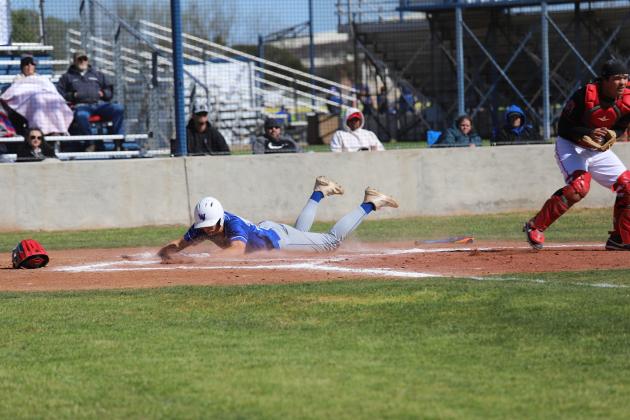 Jaxon Stark slides into home