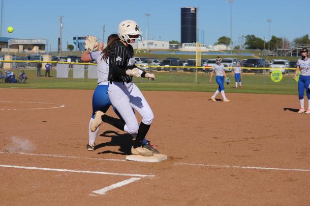 Serenity Jones beats the throw to first