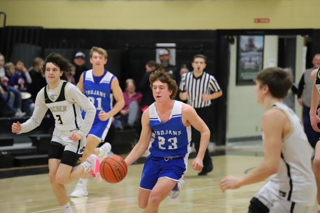 Windthorst's Brock Belcher speeds down the court