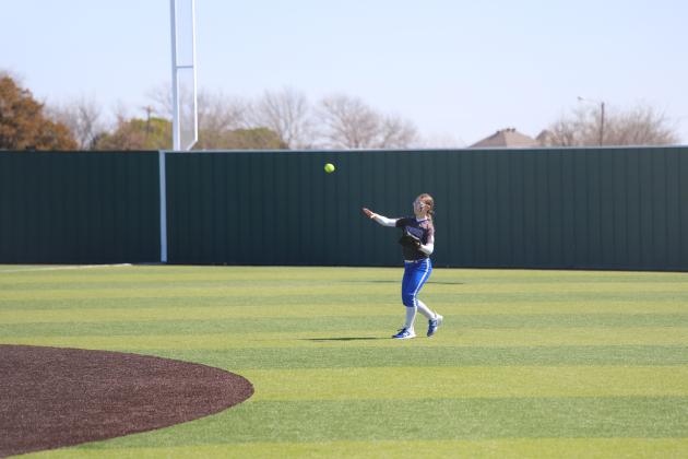 Chloe Schroeder makes the throw from centerfield
