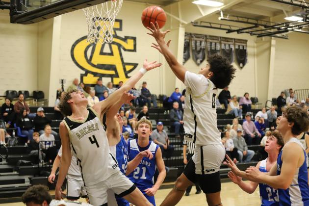 Archer City's Kole Stovall fights for the rebound