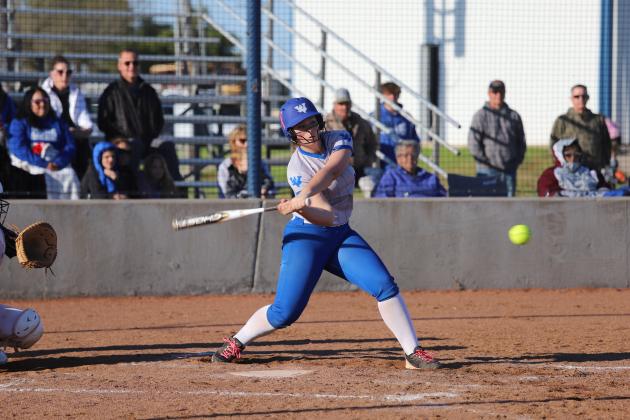 Heidi Tackett hits the ball 