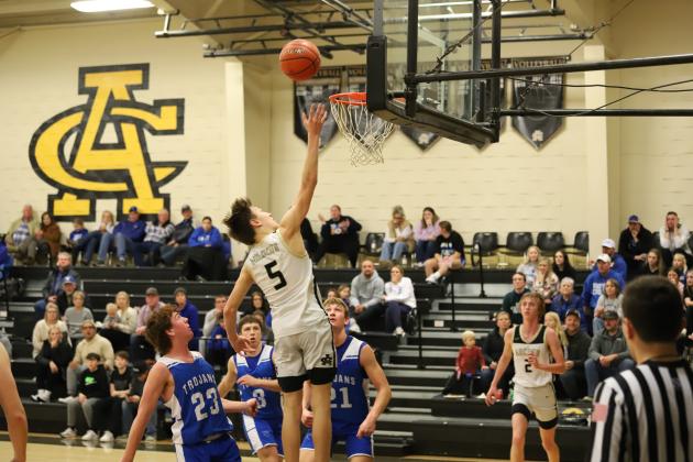 Archer City's Landon Smith leaps high for layup