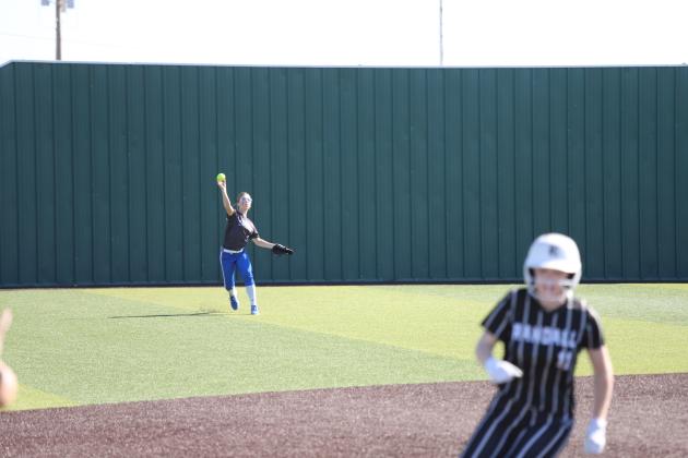 Chloe Schroeder throws from centerfield