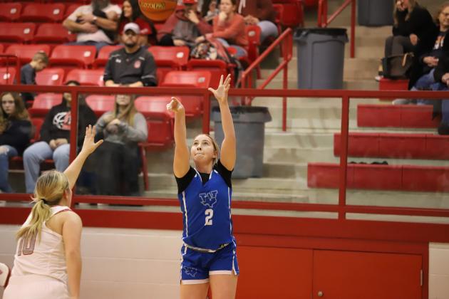 Windthorst's Megg Lindley attempts a three-pointer