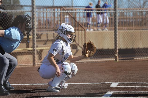 Addy Peters sits at catcher