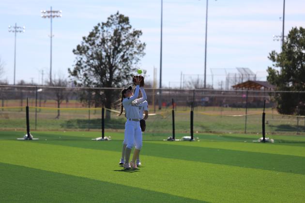 Nicole Crouse catches a fly-ball