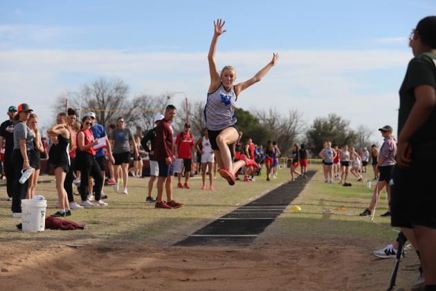Rylee Wolf jumps in the long jump