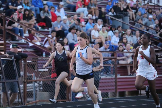 Chloe Schroeder finishes through the line