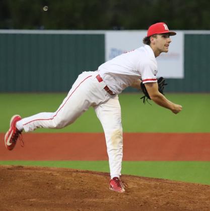 Grant Cox pitching
