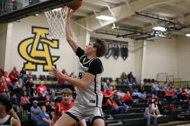 Archer City's Chance Warren puts in a layup 