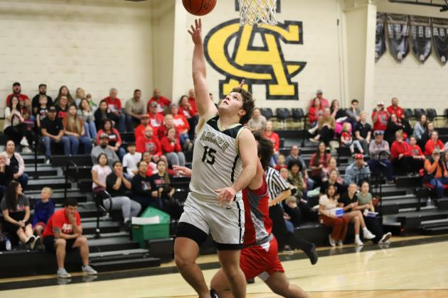 Archer City's Kline Mayo puts in a layup 