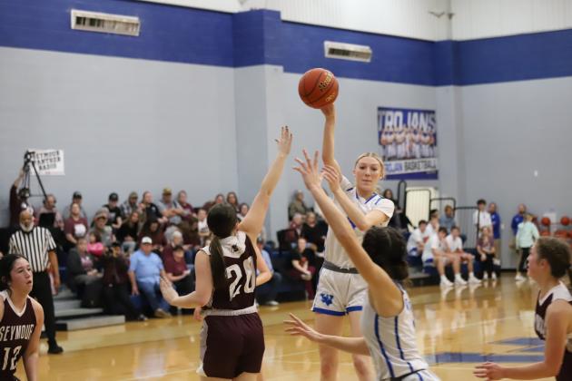 Windthorst's Rylee Wolf tosses the ball to an open Saige Anderson