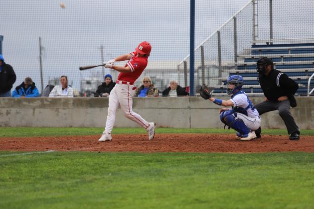 Cooper Turner hits the ball