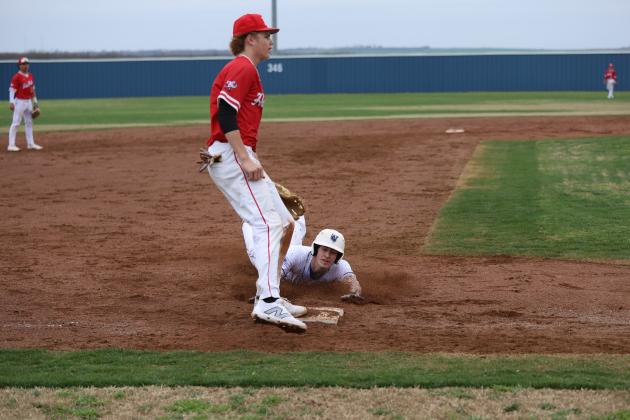 Tanner Doyal slides into third