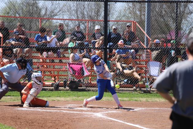 Kamdyn Neal swings the bat
