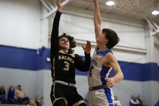 Archer City's Haegen Deerinwater puts a shot over Windthorst