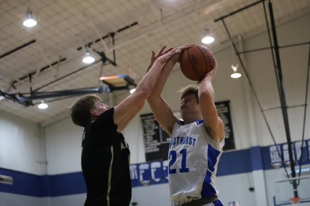 Windthorst's Jaxon Stark puts up a tough shot