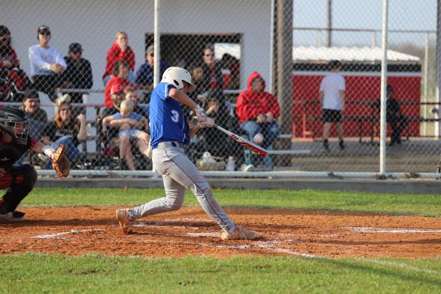 Conner Schreiber hits the ball