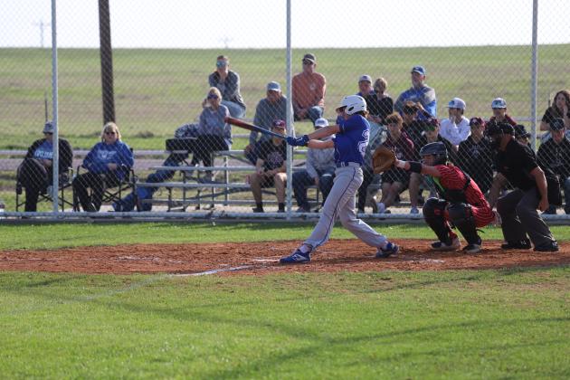 Brock Belcher swings away