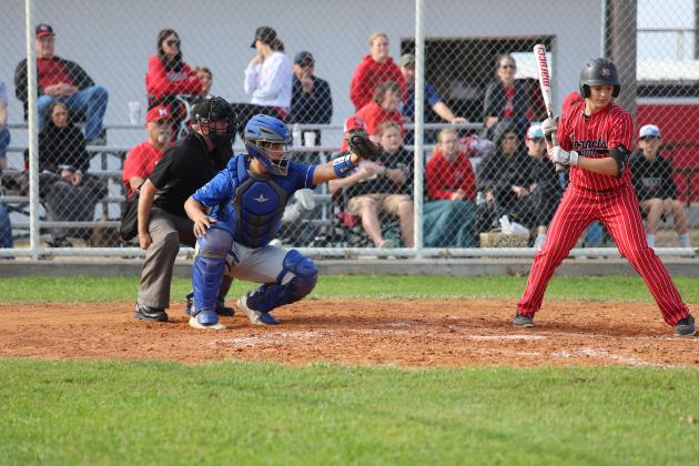 Aiden McQueery sits at catcher