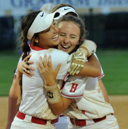 Seniors Bree Zellers (L) and Taylor Gillit (R) embrace following the Lady Eagles' win over Jacksboro to send Holliday to state for the first time (Courtesy Jonathan Hull)