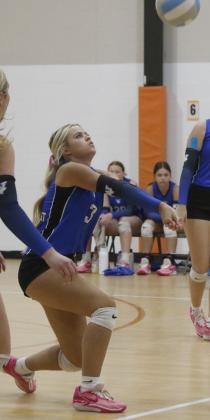Atlee Wyrick digs the ball