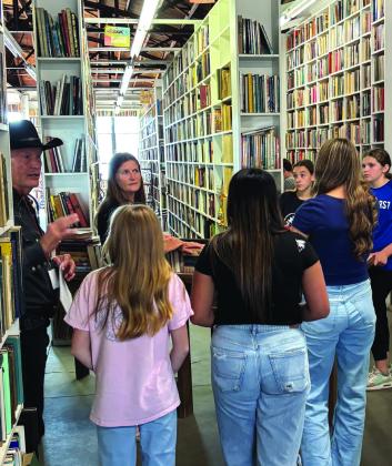 Windthorst 7th graders are lead on tour by George Getschow of the Larry McMurtry Literary Center. Photo/Nathan Lawson