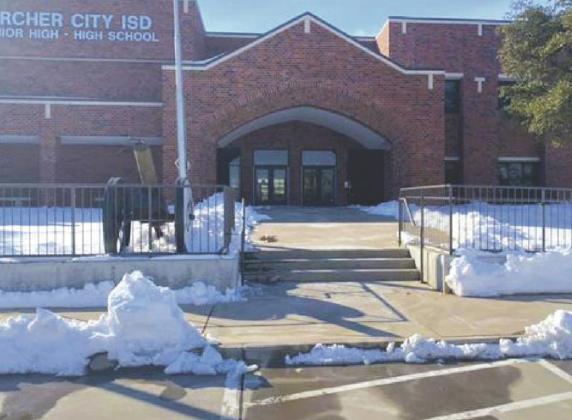 ACISD maintenance crew worked hard at clearing the sidewalks around the campuses to ensure a safe return to class for students. Courtesy photo/ACISD