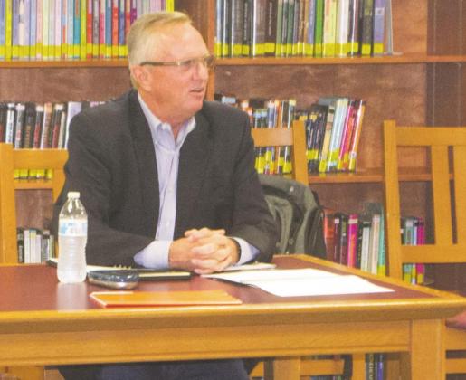 Craig Cunningham presents the bond refinancing options to the WISD school board Monday, Sept. 14. Photo/Nathan Lawson