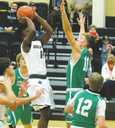 Freshman Elijah Jackson pulls up for a jumper in Archer City’s 47-37 loss to Iowa Park on Saturday, Dec. 5. Photo/Jerry Phillips