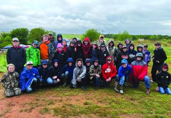 The Archer County 4-H pistol and rifle teams pose for a photo at recent pistol and rifle meet. Courtesy photo